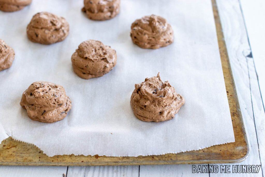 batter on parchment lined baking sheet