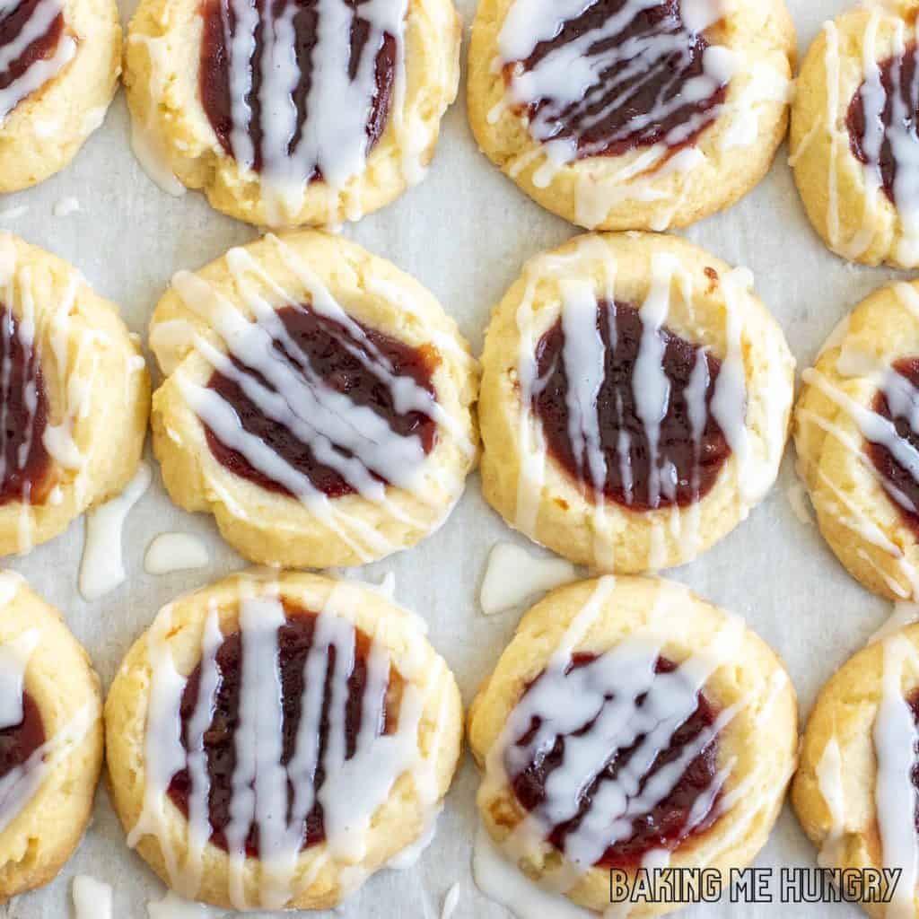 lemon raspberry cookie recipe with lemon glaze close up on parchment paper