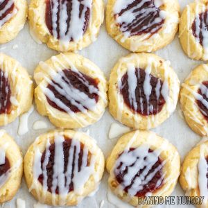 lemon raspberry cookie recipe with lemon glaze close up on parchment paper