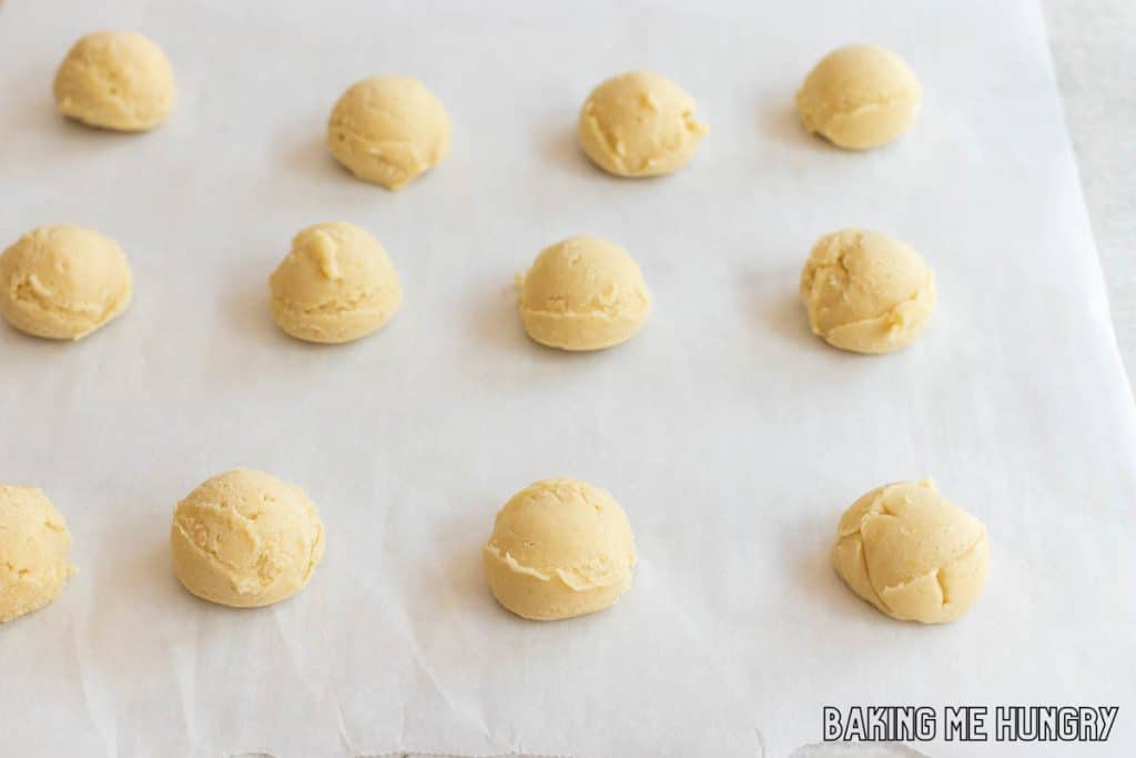 balls of dough on parchment paper