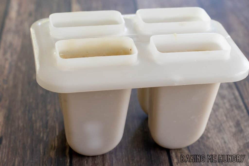 creamy banana popsicles recipe ice pop mixture added to molds