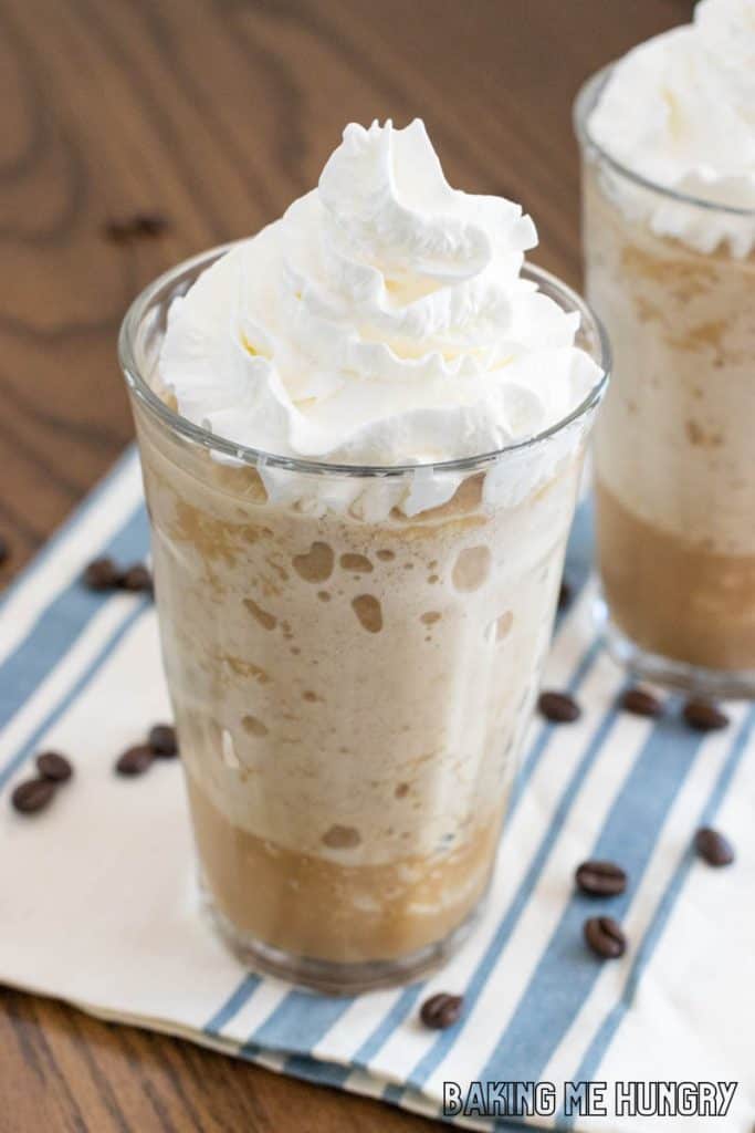 coffee slushy recipe in two glasses with whipped cream