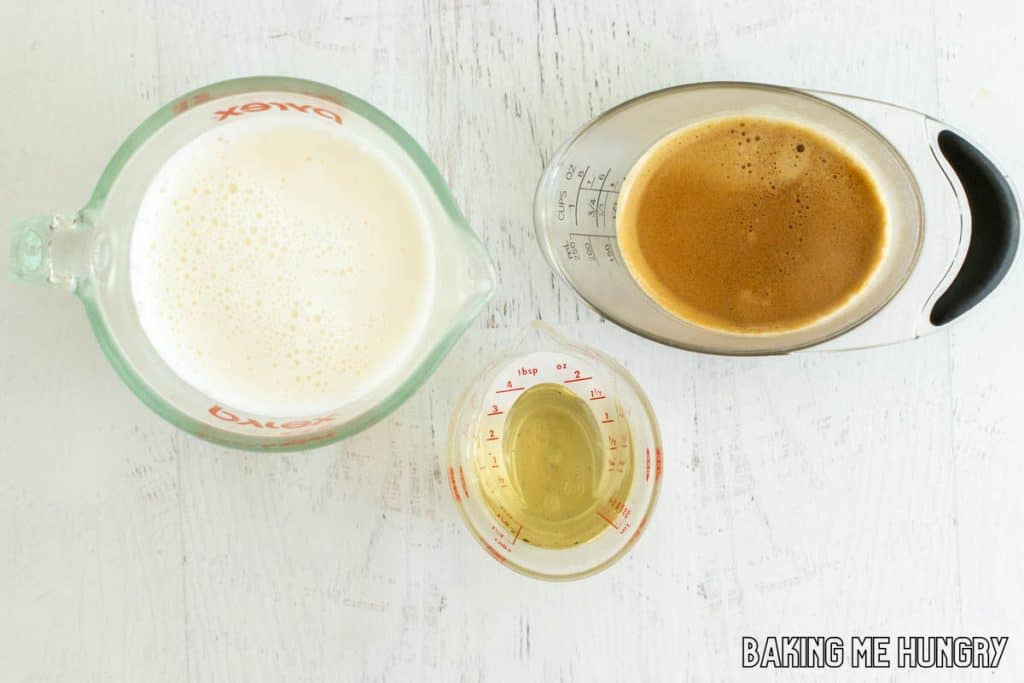 drink ingredients in small measuring cups