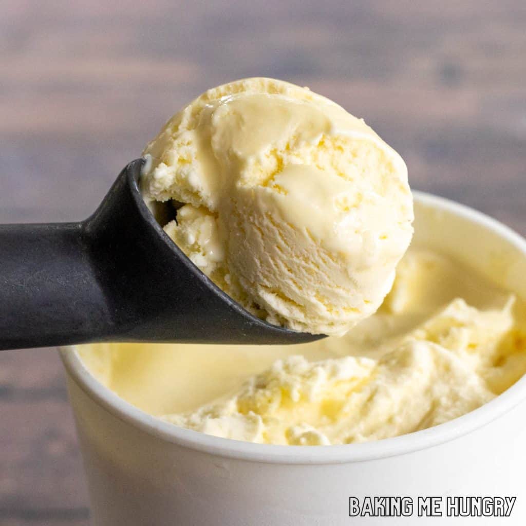 scoop of lavender lemonade ice cream on an ice cream scoop close up