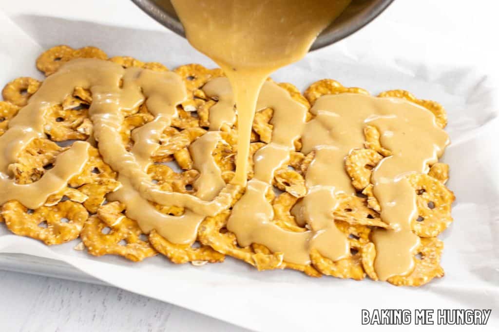 caramel being poured on pretzels