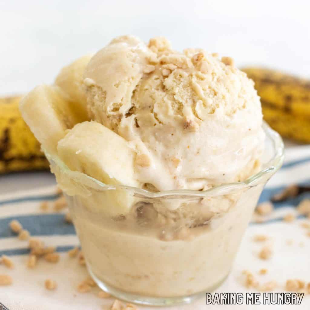 banoffee ice cream in bowl with banana slices and whole bananas behind