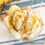 banoffee ice cream recipe from overhead in small dish with caramel sauce, banana slices, and toffee bits