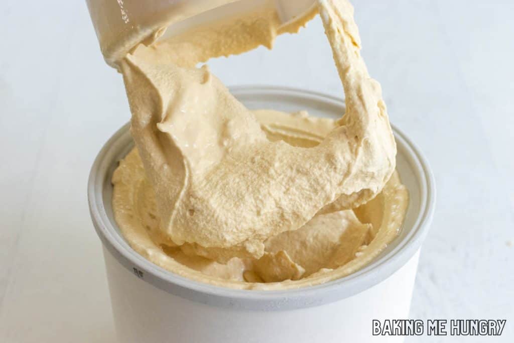 churning blade being removed from freezer bowl