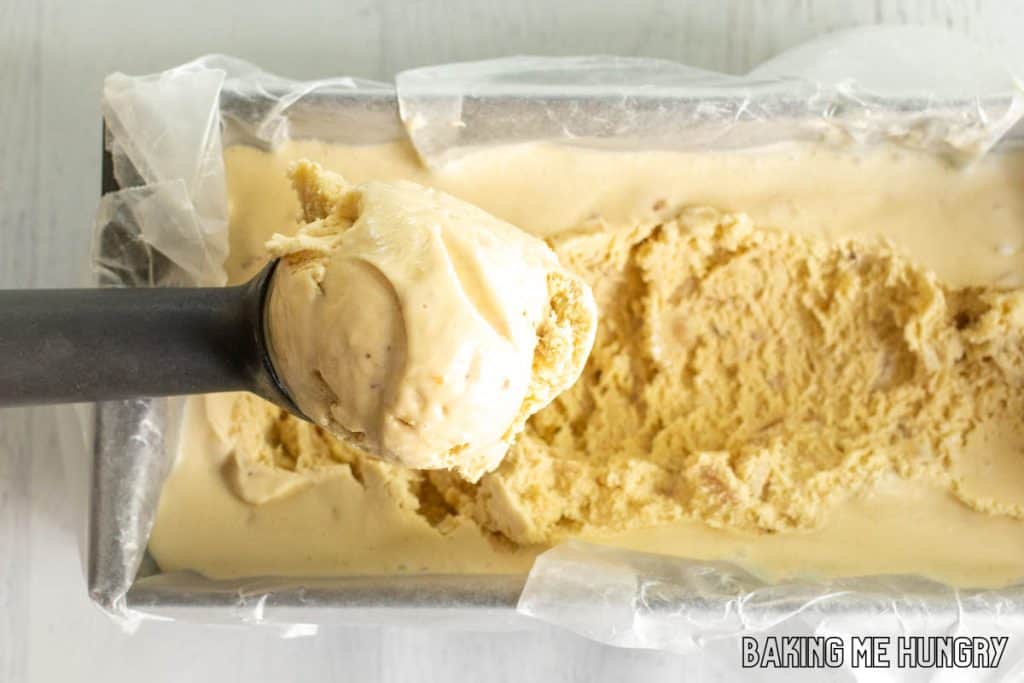 ice cream scoop in loaf pan with caramel crunch ice cream