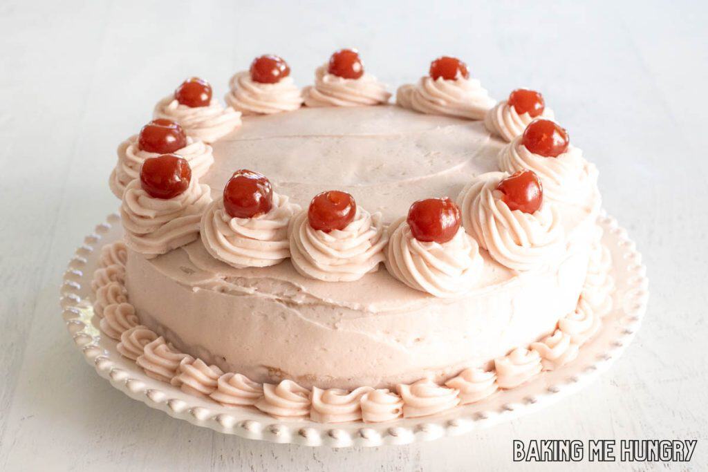 decorated cake on cake platter