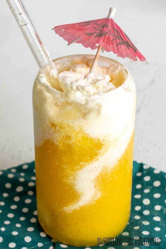mango slushy topped with whipped cream