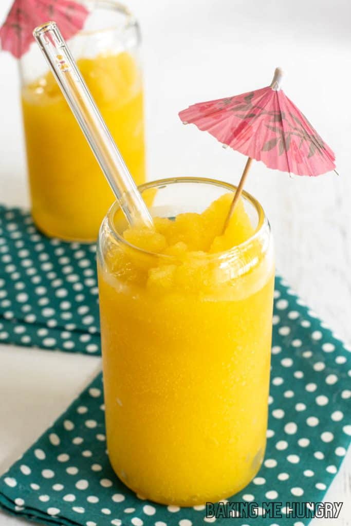 mango slushy recipe mango slushy recipe in two glasses with paper straws