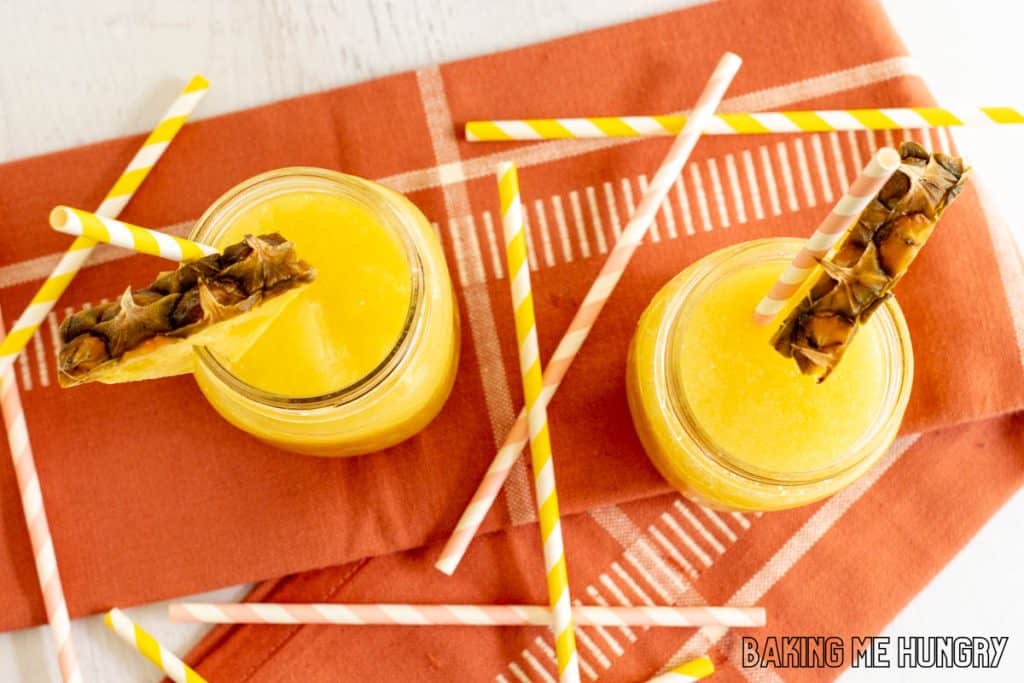 pineapple slushy recipe in two glasses from overhead