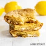 lemon blondies recipe shown with three in a stack