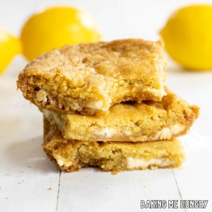 lemon blondies recipe shown with three in a stack