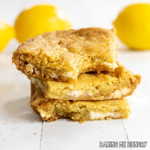 lemon blondies recipe shown with three in a stack