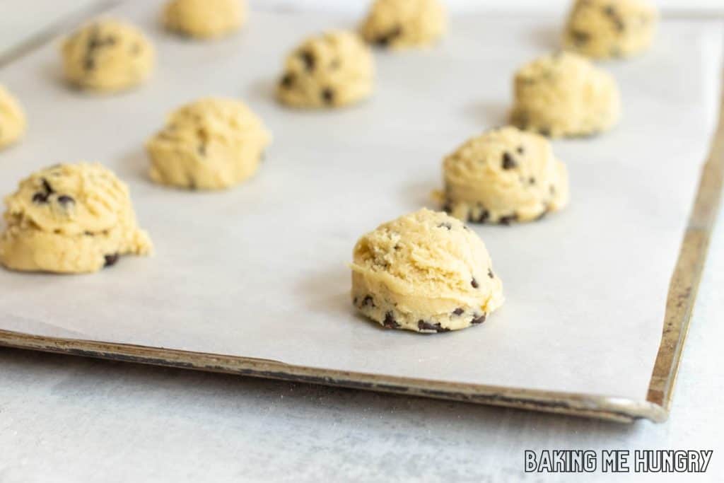 balls of dough on parchment lined pan