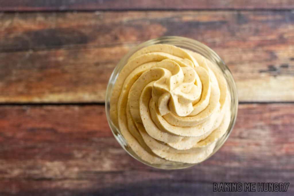 overhead shot of swirled pumpkin mousse in glass dish