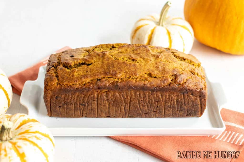 chocolate chip pumpkin banana bread on white plate