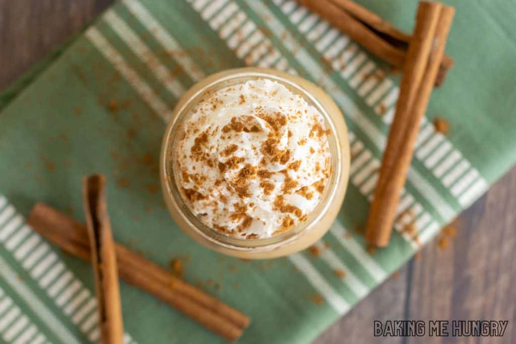 iced pumpkin spice latte in a mason jar from overhead