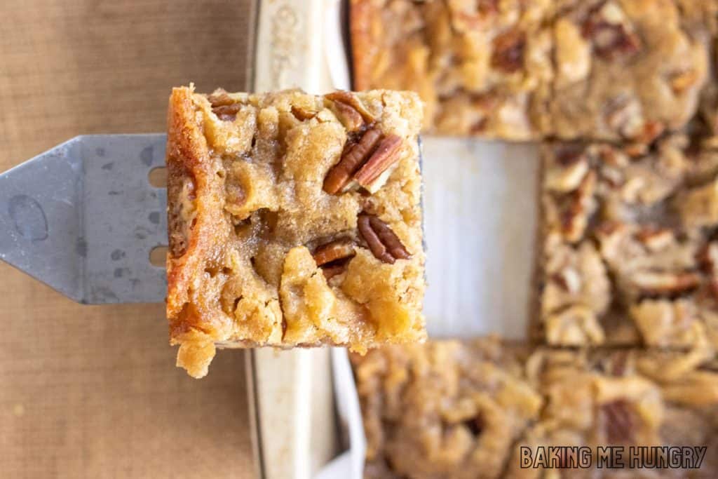 one of the maple pecan blondies on a serving spatula