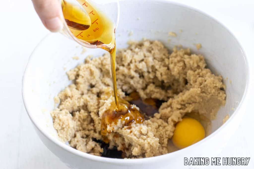 maple syrup being added to bowl