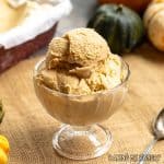 pumpkin spice ice cream served in pedestal bowl close up